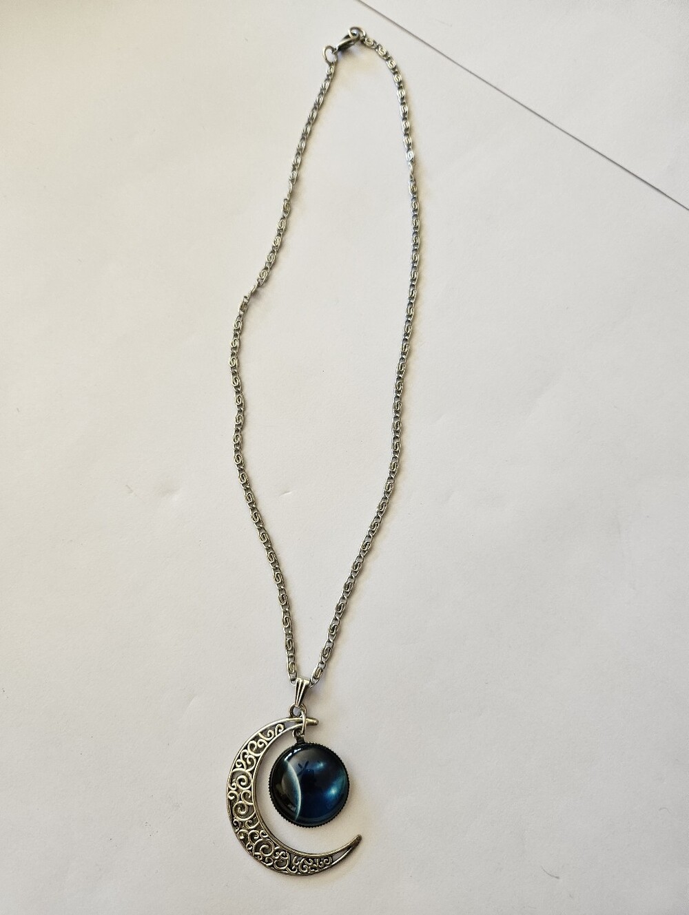 Silver Crescent Moon Necklace with Blue Glass Pendant
